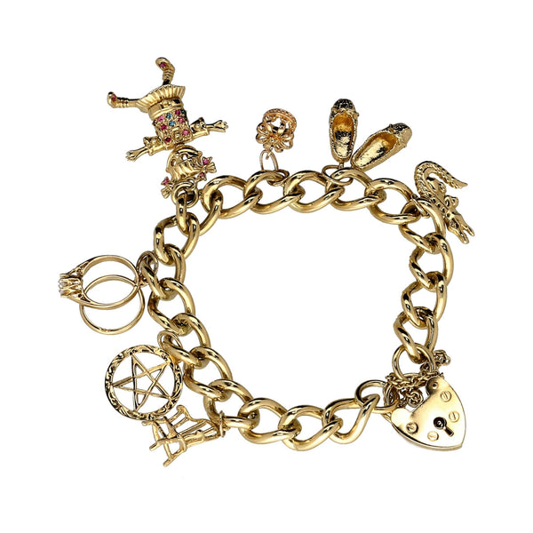 9ct Yellow Gold Ladies Charm Bracelet 7 Charms - 47.30 grams