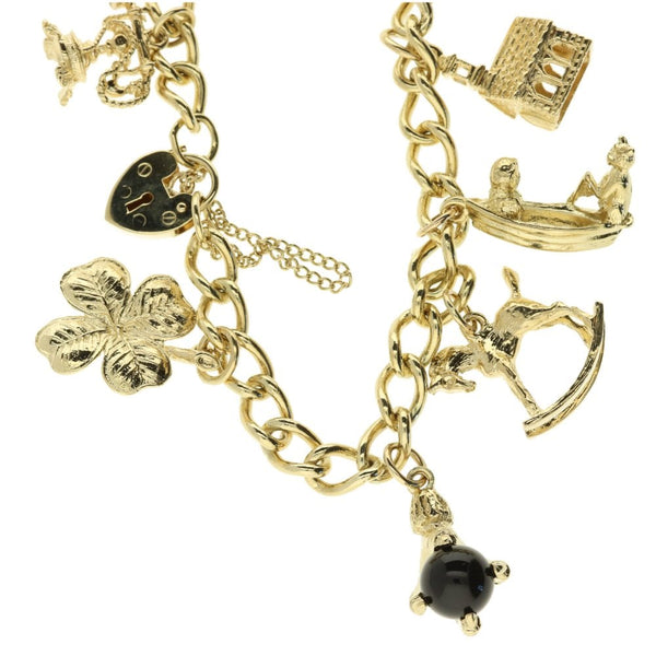 9ct Yellow Gold Ladies Charm Bracelet And Assorted Charms - 34g