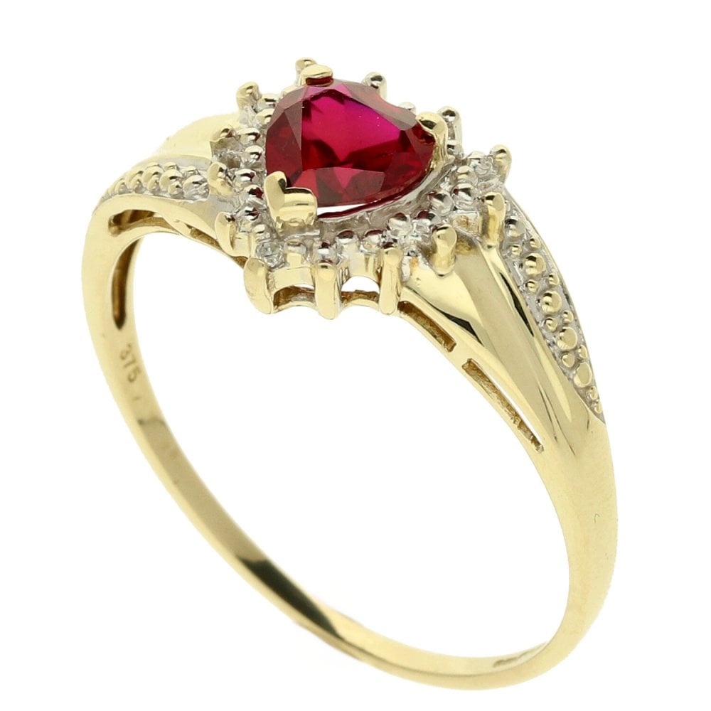 9ct Yellow Gold Diamond & Ruby Twist ring. -Size V