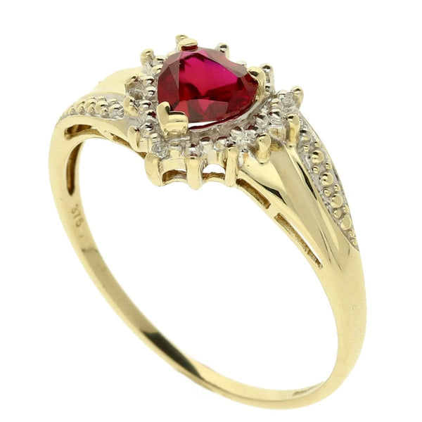9ct Yellow Gold Diamond & Ruby Twist ring. -Size V