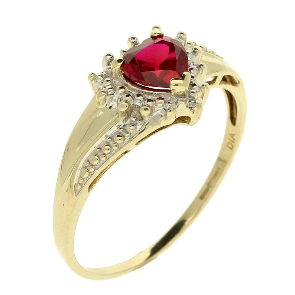9ct Yellow Gold Diamond & Ruby Twist ring. -Size V