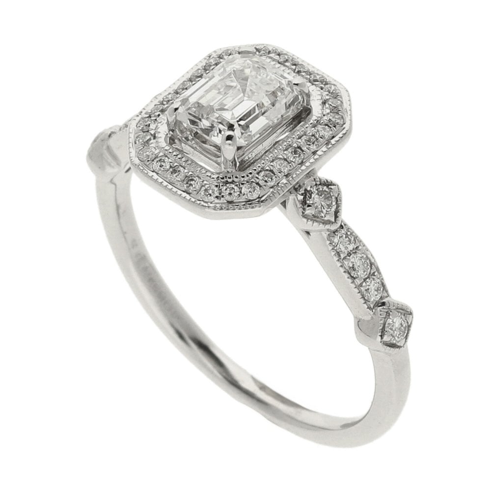 Platinum Halo Emerald Cut Diamond Ring - 0.75ct