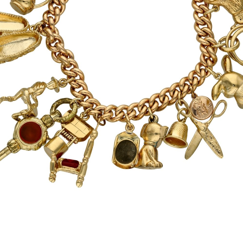 9ct Yellow Gold Charm Bracelet - 19 Charms - 55.6g